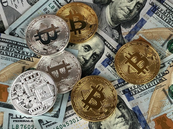 Bitcoin coins representing a non-custodial BTC payout from a TON exchange