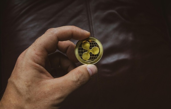 Collection of cryptocurrency coins representing 145+ supported assets