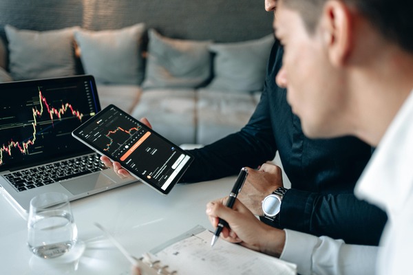 Multi-currency crypto trading desk representing TON fiat price references